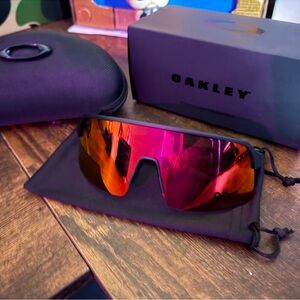 Oakley Shield Sunglasses with Pink-Red Mirrored Lens